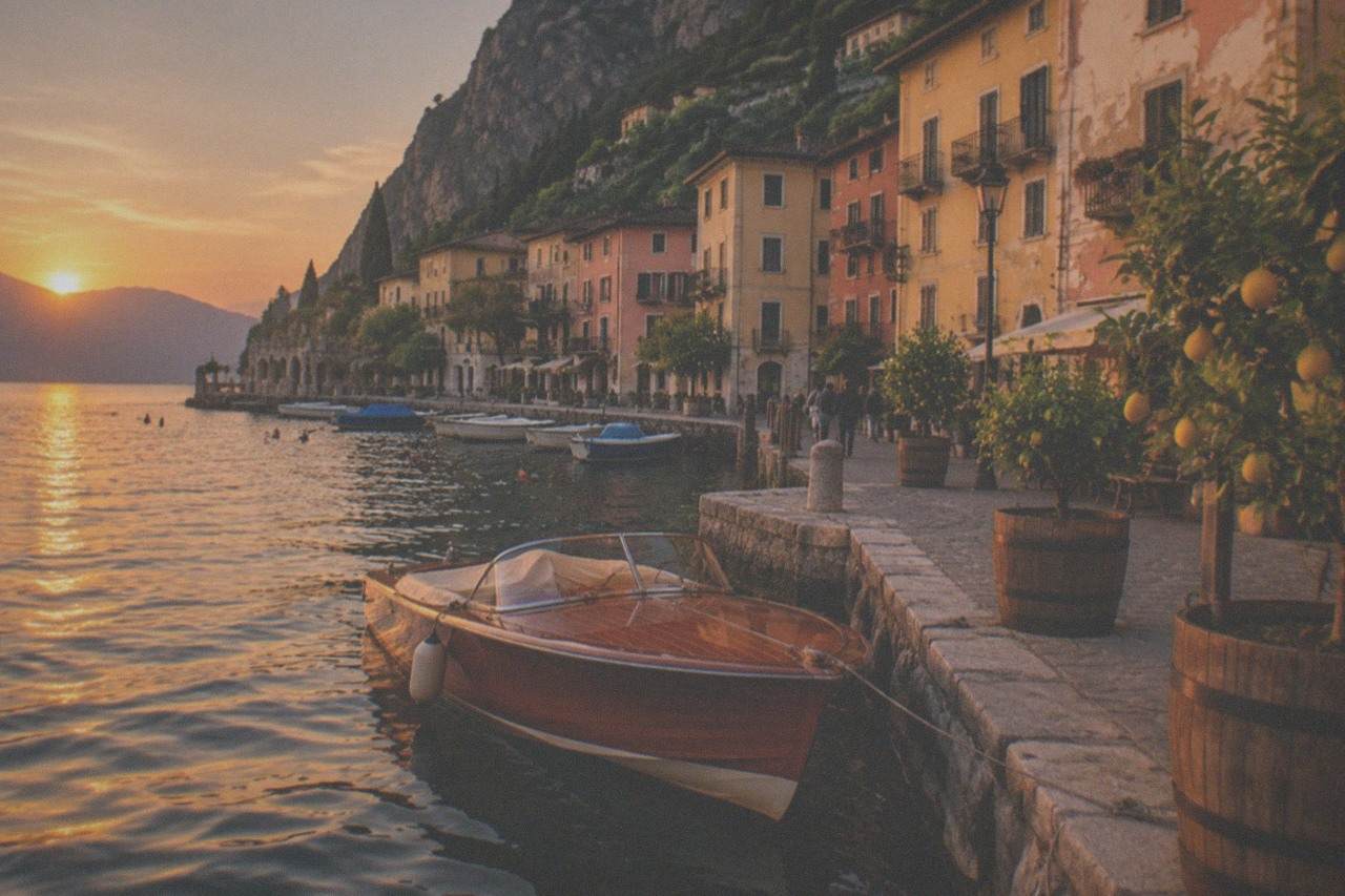 A small wooden motor boat moored beside a stone landing stage on a calm lake at golden hour